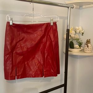 Red leather mini skirt with thigh slits